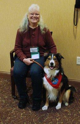 Therapy team Ein & Tucker receiving their visitors pass to a local assisted living facility