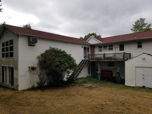 Milton, PA - 50 year GAF shingle roof in Patriot Red.  Including removal of old roof, new underlayment, flashing, ridge vents.