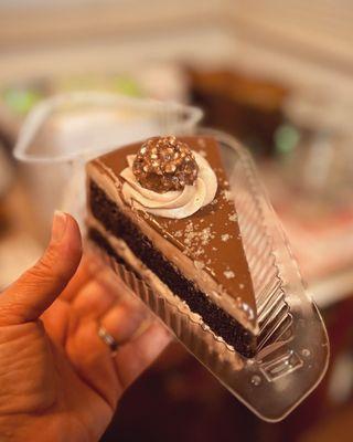 Nutella Chocolate Cake slice - insanely good! Topped with a Ferrero Rocher!