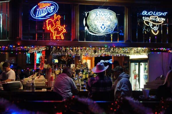 neon cowboys, belt buckles, and real cowboys!