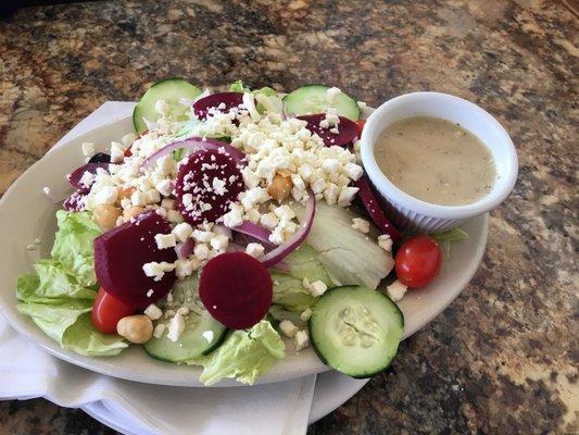 The small Greek salad. Small meant to serve 2, large will serve 4