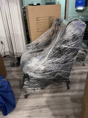 This is a picture of a chair that they use cellophane .. Ridiculous