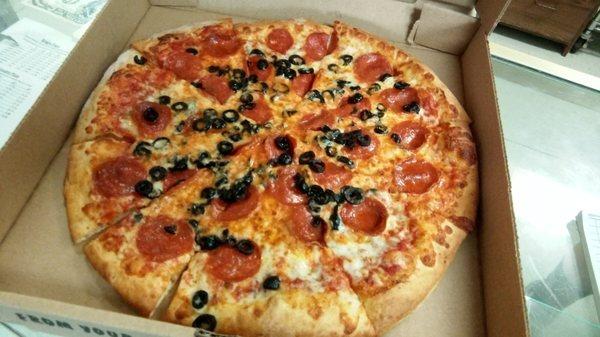 Extra thin pepperoni with black olives. (Green is also available)