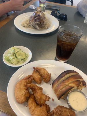 Chicken Tender dinner with garlic bread, house slaw, and garlic parmesan dip. Hock and Kraut dinner with potatoes.