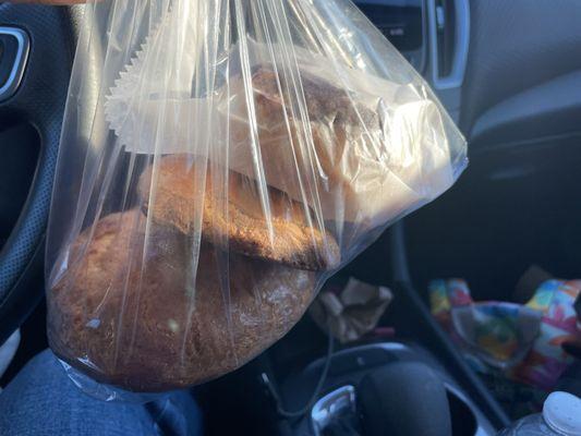 I got a doughnut, a pastry shaped like a pig, and a round sweet bread with vanilla inside!