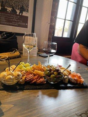 A charcuterie board of the week with paired wine. Such a lovely place with very friendly staff and so many goodies to choose from.