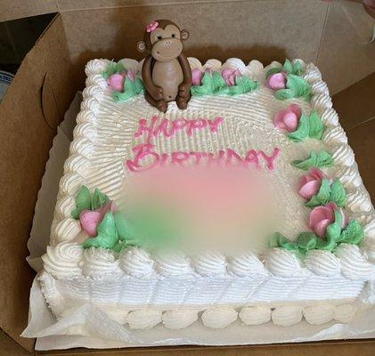 Great 10" vanilla cake for girl's birthday. Under $50! (Monkey was added separately)