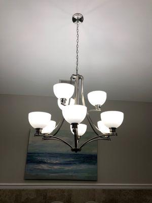 Third light fixture they installed. I'm extremely pleased!