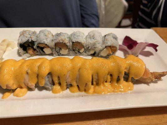 shrimp tempura roll, Philadelphia roll and an orchid