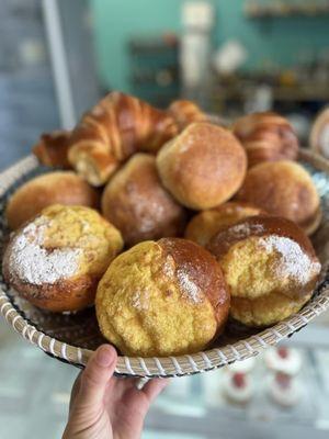 Try the Coconut Bread, aka Pão de Deus (God's bread); Pão de Água (Portuguese Roll); or Portuguese Croissant.