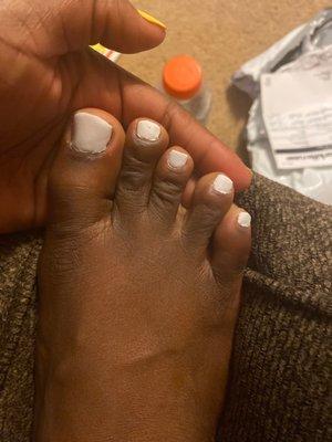 White gel polish pedicure after one day .