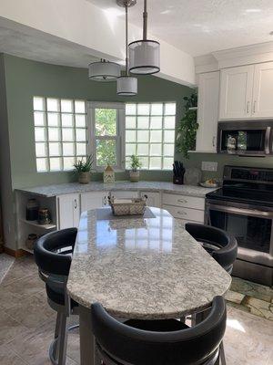 Our installers did a fine job with the curved wall and Cambria Quartz Berwyn counter tops!