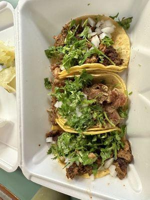 Carnitas and adobada street tacos