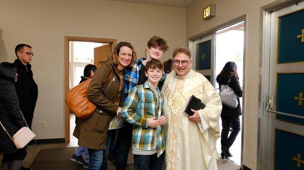 Youth family from the school at St. Anthony attending Sunday mass.