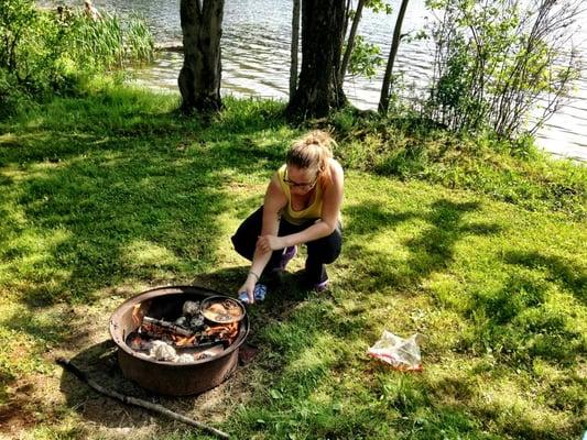 Photo Courtesy of Lauren S. - cooking in the fire circle thingy