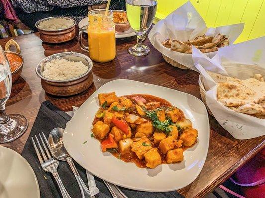 Basmati rice, mango lassi, naan, and chill paneer - all incredible.