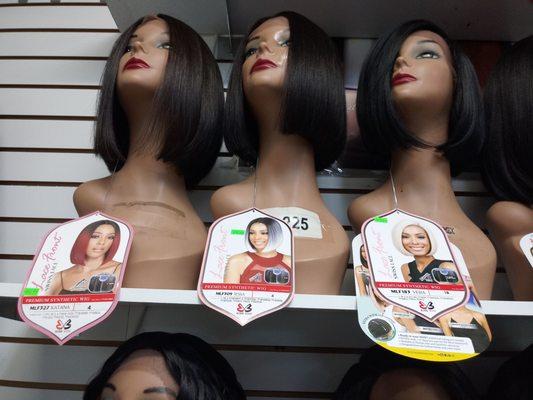 These are some of Bobbi Boss wigs that are in a bob style .They are synthetic, but are able to take heat on low to medium settings.