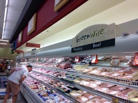 Hubby browsing the meats for his next smoking meat adventure