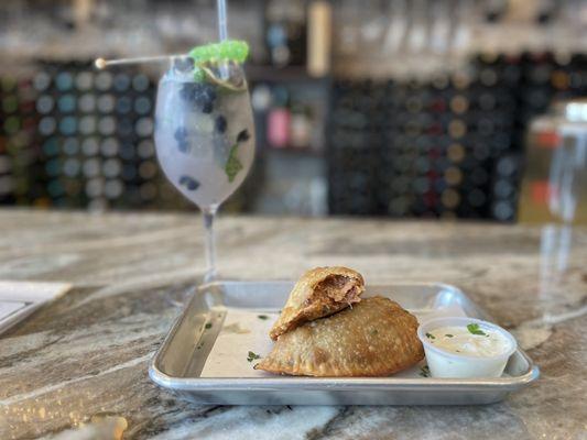 Blueberry lavender mojito and crab empanadas