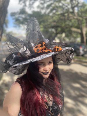 dropping off custom witchy hat