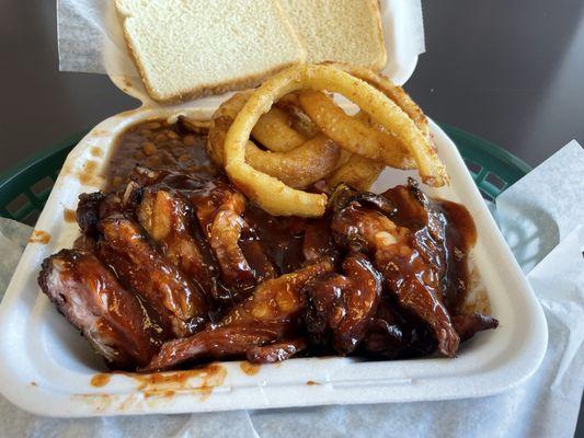 Rib Tip Plate. Onion Rings Sides. Lg. Baked Beans Sides. Solid but I've had better. I'll try something else soon.