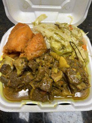 Curry goat cabbage and yams