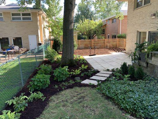 Side view of patio and yard after