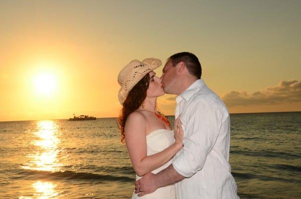 Dr. Stitzel and his wife, Monica, on the beach where they were married.