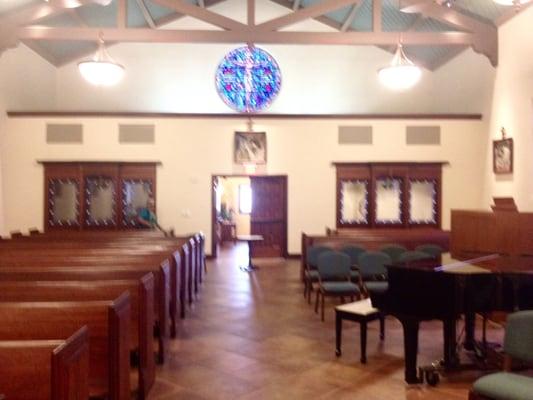 Looking towards the back of the left-side pew section