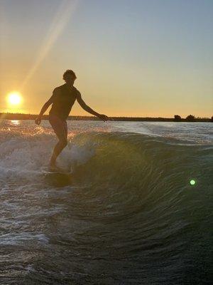 Sunset water sports on the smooth delta water.