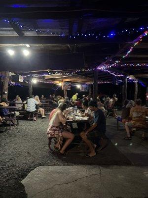 Dance floor. Locals, musicians, old hippies, kids, families, people of all ages.