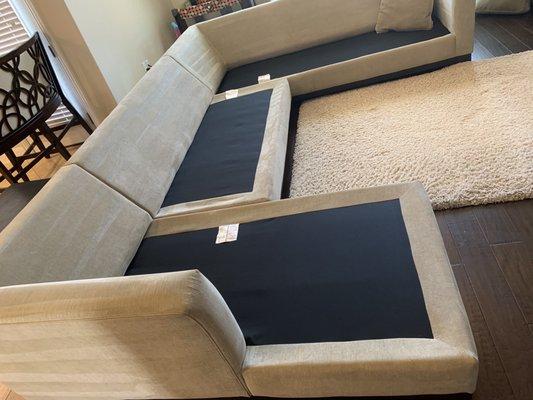 Huge sectional, off white area rug