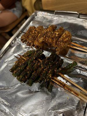 Green beans and pork belly wrapped enoki mushrooms skewers