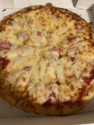 Thin crust ham and pepperoni pizza