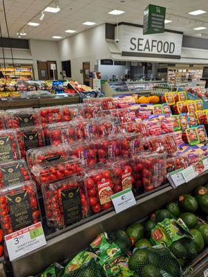 Inside the produce section. Seafood section in background. I regularly eat Sugar Bombs tomatoes.