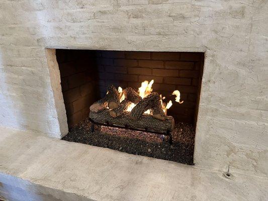 Our repaired firebox and new gas logs.