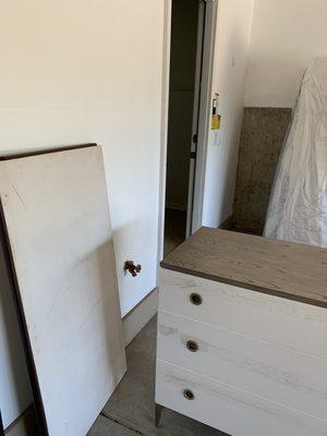 Drawer and mattress left in garage