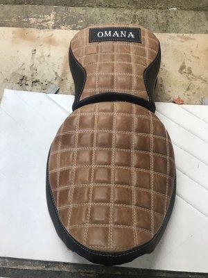 Reupholstered motorcycle seat.