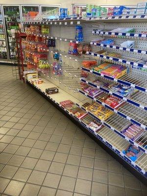 Mostly empty snack shelves