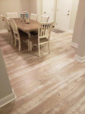 Mannington Restoration laminate gave this condo a relaxing beachy feel!