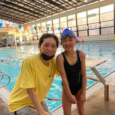 Happy swimmer, happy coach! What a great opportunity to learn to swim from an Olympian!