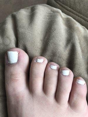 Uneven, clumped paint, horribly cut/shaped nails