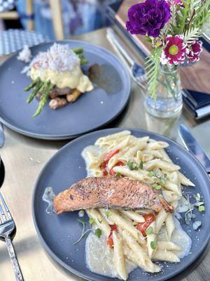 Salmon penne in the front and filet mignon topped with crab and asparagus in the back!