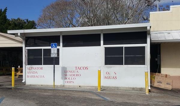 Crazy little walk-up window where you order your amazing tacos.