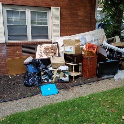 evicted persons property left outside building  not disposed of properly creating an eyesore