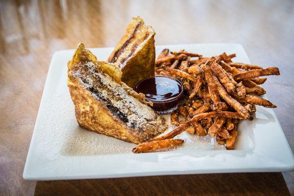 The Monte Cristo sandwich with sweet potato fries