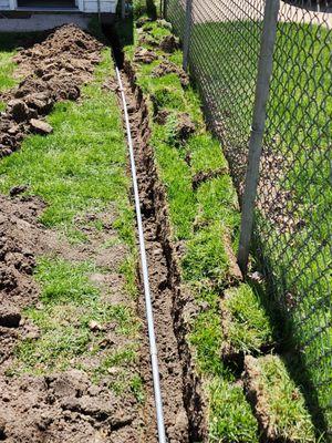 Trench dug, conduit with new wire to my garage installed.