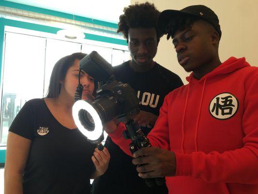 Young people learn about video cameras and digital equipment at Street Level, a program of Urban Gateways.