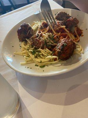 Spaghetti and meatballs with red sauce