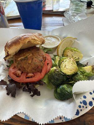 Crab cake sandwich with Brussels sprouts side